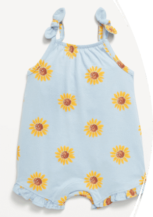 Mameluco celeste con estampado de flores amarillas