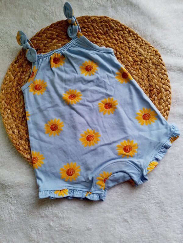 2 Mameluco de estampado flores amarillas Talla: 6-12 meses